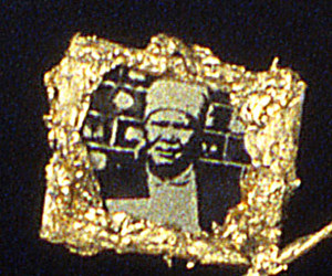 Necklace (detail-family)-Images of the family the miners left to work in the mines