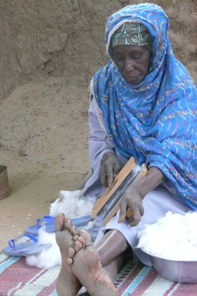 Woman carding cotton in Banemba, Mali. 2008